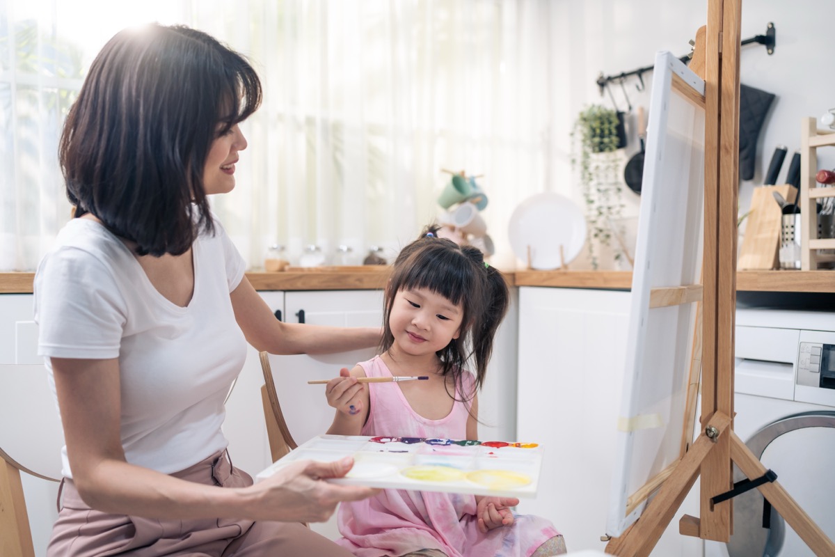A parent and child spending time together at home