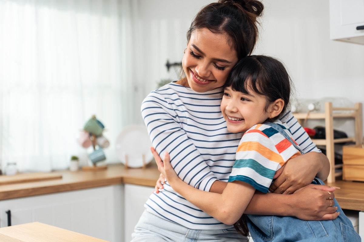 A parent and child at home