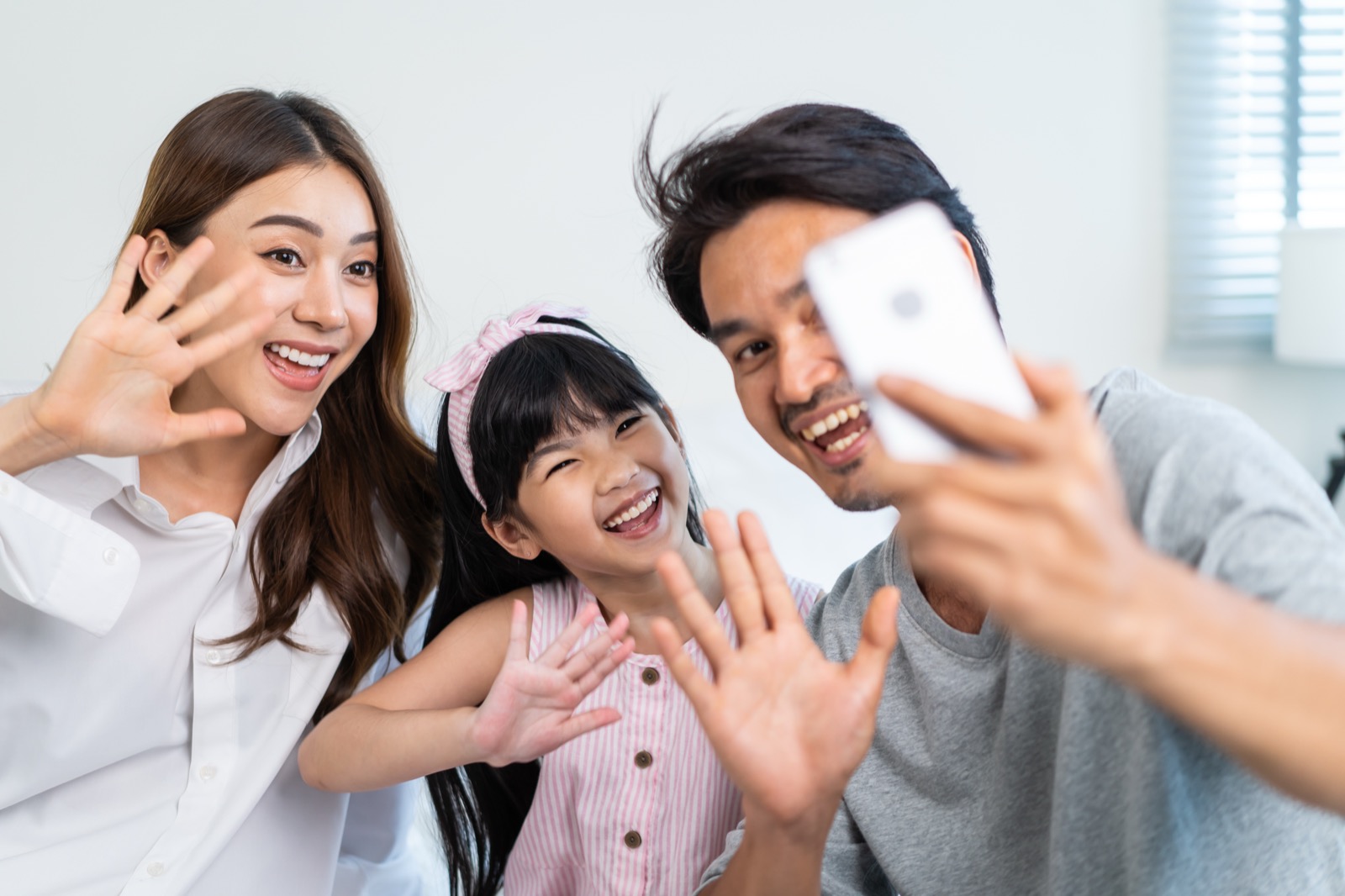 A family in Bangkok using Hello Nanny Plus together at home
